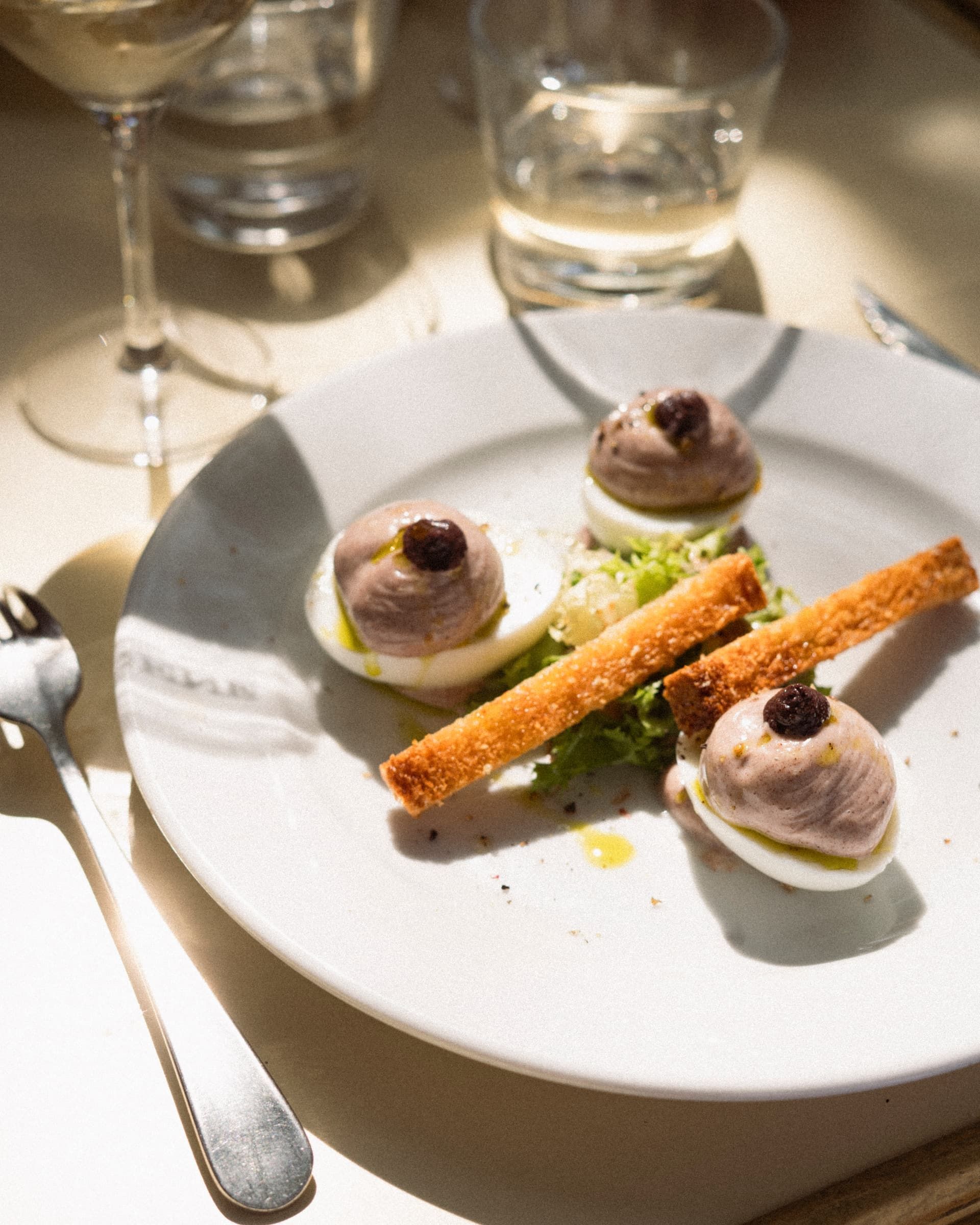 Eggs mayonnaise, toasted bread and frisée